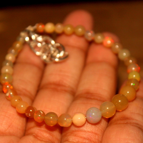 25.90 Crt Natural Ethiopian Fire Opal Round Balls Bracelet 99