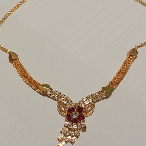 beautiful gold-plated necklace with white and red zirconia