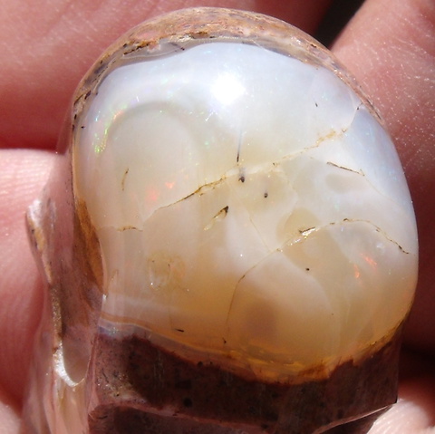 105.12 Carats Mexican Matrix Fire Opal Skull Gem Carving