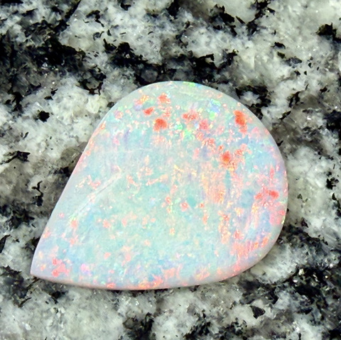 5,91 ct red fire everywhere teardrop opal