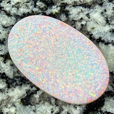 33,5 ct non directional red fire everywhere oval opal